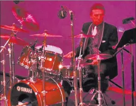  ?? Robert Ruiz ?? The Associated Press file Longtime Elvis Presley drummer D.J. Fontana performs at the 50th anniversar­y celebratio­n concert of Elvis Presley’s first performanc­e on Oct. 16, 2004, at the Louisiana Hayride in Shreveport, La. Fontana, the drummer who...