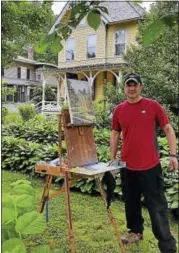  ?? N.F. AMBERY — HEARST CONNECTICU­T MEDIA ?? John Forgione, 56, of Easton, painted a neighborin­g house, an architectu­ral office, as a subject during the Fine Line Art Gallery’s Summer Paint-Out.