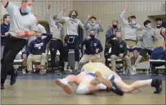  ?? AUSTIN HERTZOG - MEDIANEWS GROUP ?? The Spring-Ford bench celebrates a takedown from Zach Needles at 160 pounds during the District 1-3A Duals championsh­ip Saturday.