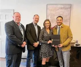  ?? Lisa Esneault ?? From left, Roxbury First Selectman Patrick Roy, Washington First Selectman Jim Brinton, Regional Hospice President and CEO Cynthia Emiry Roy and Trayvonn Diaz from Sen. Chris Murphy’s office celebrated the official opening of The Center for Hope & Healing in Washington Depot on Feb. 16.