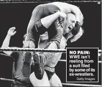  ?? Getty Images ?? NO PAIN: WWE isn’t reeling from a suit filed by some of its ex-wrestlers.