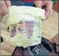  ?? HT PHOTO ?? ■
The money concealed in a tiffin recovered during the search.