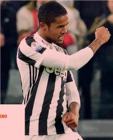  ?? ANSA ?? Douglas Costa, 27 anni, esulta dopo il gol