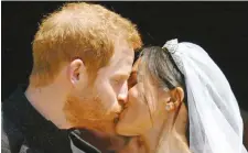  ??  ?? Prince Harry and his wife Meghan, Duchess of Sussex on their wedding day.