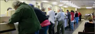  ??  ?? Drivers at a South Carolina Department of Motor Vehicles office during a program that allowed some people with suspended licenses to get them reinstated. Many states have opted out of a federal law that calls for stripping the licenses of those with...