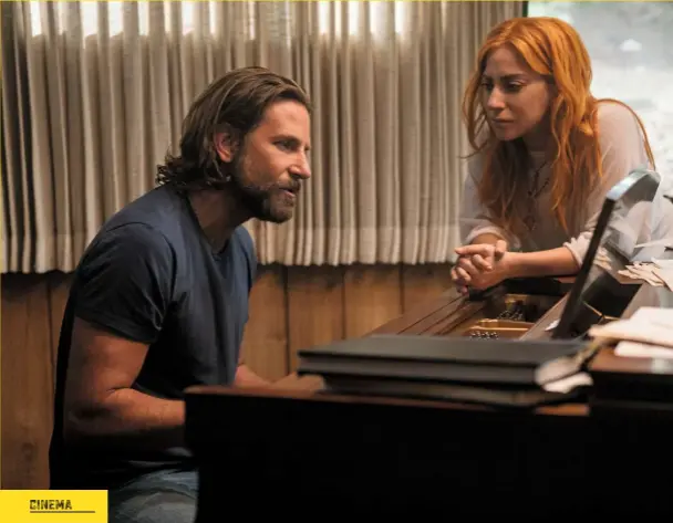  ??  ?? The sweet sound of love: Jackson Maine (Bradley Cooper) serenades Ally (Lady Gaga).