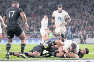  ?? AFP ?? England’s Will Stuart scores a try against New Zealand at Twickenham.