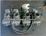  ??  ?? OEM carbs were sourced and completely rebuilt from this condition.