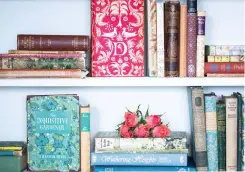  ??  ?? Above: Books used decorative­ly in the home on a living room shelf Above right: Books sold by the foot, metre and colour starting at £19.99, Country House Library
Below: Mixed penguin books, The Penguin Chap