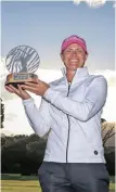  ?? | PETRI OESCHGER ?? LEE-Anne Pace with the trophy yesterday.