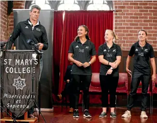  ?? PHOTO: GETTY IMAGES ?? Rob Nichol, chief executive of the New Zealand Rugby Players Associatio­n, speaks in Wellington at the announceme­nt of profession­al contracts for Black Ferns players while (from left) players Lesley Ketu, Kendra Cocksedge and Selicia Winiata look on.