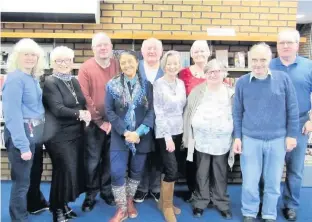  ??  ?? Calendar team (second right) Project Group including tutor Colleen Blyth (fourth left) and John Reilly