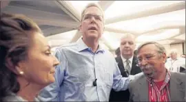  ?? Photograph­s by
Jim Cole
Associated Press ?? JEB BUSH, the former Florida governor who has not yet announced his candidacy, focused on depth of experience, with indirect jabs at Sen. Marco Rubio.