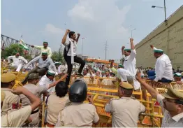  ??  ?? Farmers raise slogans during the kisan panchayat held under the banner of Bharatiya Kisan Union on Delhi-UP border at Ghazipur in New Delhi on Wednesday. —PTI