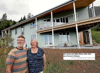  ?? PHOTO: MARTIN DE RUYTER/STUFF ?? Ali Locke and Mike Moss with their new home in Nelson.