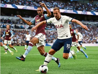  ?? — aFP ?? Working in his favour: Tottenham’s Harry Kane (right) has been able to recover without the worry of missing matches due to the suspension of the english Premier League.