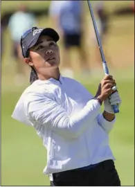  ?? ?? Danielle Kang watches her shot on the 16th hole during the final round of the nW arkansas Championsh­ip on Sunday in rogers. Kang shot a season-best 64 in the final round, but fell to atthaya thitikul in the second playoff hole.
(ap/Michael Woods)