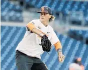  ?? AP FILE ?? Left-hander Braxton Garrett, 19, was diagnosed with a torn ligament in his pitching elbow.