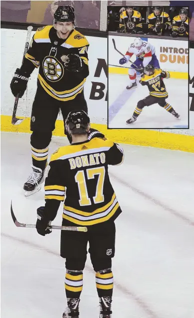  ?? STAFF PHOTOS BY NICOLAUS CZARNECKI ?? YOUNG GUNS: Jake DeBrusk (74) celebrates the first of his two goals yesterday against Florida with Ryan Donato, who added his fourth goal in just seven NHL games.