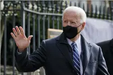  ?? PATRICK SEMANSKY — THE ASSOCIATED PRESS ?? President Joe Biden waves as he departs after attending Mass at Holy Trinity Catholic Church, Sunday, Jan. 24, 2021, in the Georgetown neighborho­od of Washington.