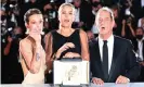  ?? Christophe Simon/AFP/Getty Images ?? Ducournau with Titane stars Agathe Rousselle and Vincent Lindon after winning the Palme d’Or at Cannes, July 2021. Photograph: