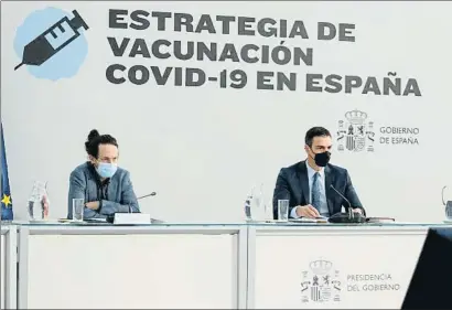  ?? MONCLOA / EP ?? Pablo Iglesias y Pedro Sánchez presentaro­n junto a Salvador Illa el plan de vacunación para la Covid-19