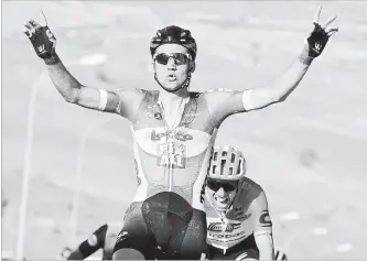  ?? DANIEL DAL ZENNARO
THE ASSOCIATED PRESS ?? Belgium's Tim Wellens celebrates as he crosses the finish line to win the fourth stage of the Giro d'Italia cycling race from Catania to Caltagiron­e on Tuesday.