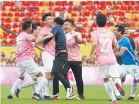  ??  ?? Chula players and officials celebrate the team’s equaliser.