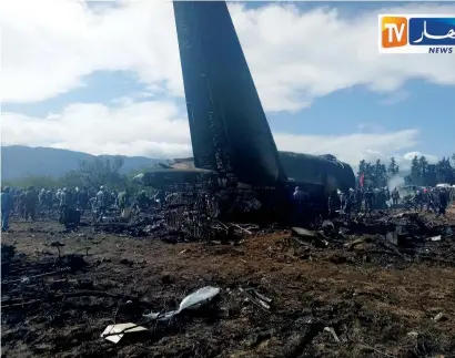  ?? Reuters ?? An Algerian military plane is seen after crashing near an airport outside the capital Algiers, Algeria, on Wednesday. —