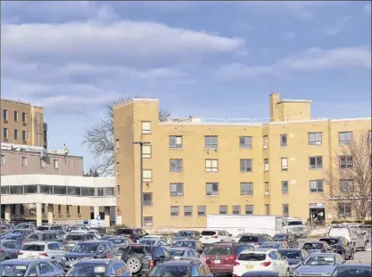  ?? Paul Buckowski / Times Union ?? A view of the east wing and the building connector at Albany Memorial Hospital on Thursday in Albany. The building and the connector are going to be demolished.