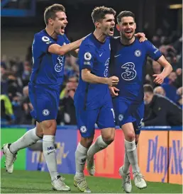  ?? — AFP ?? Chelsea’s Jorginho (right) celebrates after scoring a goal against Leicester City in their EPL match at Stamford Bridge in London on Tuesday.