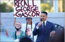  ?? PHOTO BY TREVOR STAMP ?? Residents and Whittier city officials gather for a rally to support a recall of Los Angeles County District Attorney George Gascón outside of Whittier City Hall in June. Gascón opponents might think they have enough signatures to make November’s ballot, but the verificati­on process could lead to the lack of valid signatures.