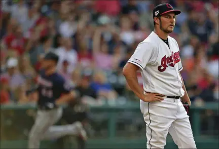  ?? DAVID DERMER — THE ASSOCIATED PRESS ?? Trevor Bauer waits for the Twins’ Max Kepler to run the bases after hitting a solo home run in the second inning July 13.