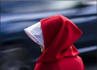  ?? PHOTO BY JINTAK HAN — DENVER POST FILE ?? A woman is dressed as a handmaid as part of the abortion rights protest in favor of abortion on June 27, 2022.