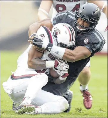  ?? COLLEGE STATION EAGLE ?? Texas A&M junior DE Myles Garrett, who boasts an impressive combinatio­n of strength and speed, recorded 12.5 sacks and 19.5 tackles for loss last season.