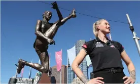  ?? Photograph: David Crosling/AAP ?? AFLW player Tayla Harris at the unveiling of a statue of her in Federation Square in
Melbourne.