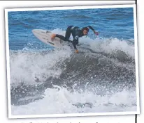  ?? Picture: Surfing Victoria ?? Emily McGettigan in the surf at Jan Juc at the weekend.