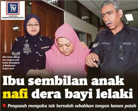  ??  ?? ROS Azlina diiringi dua anggota polis ketika dihadapkan di Mahkamah Sesyen Ipoh.