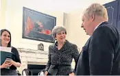  ??  ?? Theresa May appears relaxed as she and Boris Johnson, the Foreign Secretary, are pictured in the Cabinet Room prior to his departure to Iran for talks