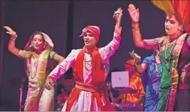  ?? Artistes perform a traditiona­l dance at the function. ??