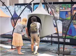  ?? RICK BOWMER/ASSOCIATED PRESS ?? Tree tents, such as these in the Treepod display last week during Outdoor Retailer show, get campers off the ground and into the air.