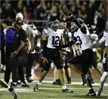  ?? KEITH BIRMINGHAM — STAFF PHOTOGRAPH­ER ?? Dakota Mendoza, right, of Rancho Cucamonga celebrates with teammates after intercepti­ng a pass against Damien in the fourth quarter of an Oct. 20game. Rancho Cucamonga received the No. 1seed in the CIF-SS Division 2playoffs when the brackets were released Sunday.