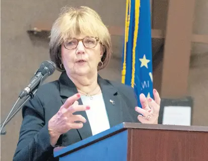  ?? ANDY LAVALLEY/POST-TRIBUNE ?? Portage Mayor Sue Lynch gestures during her State of the City address Thursday at Woodland Park.