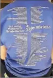  ?? SUSAN SERBIN - DIGITAL FIRST MEDIA ?? T-shirt worn by student commemorat­es a loved one lost to cancer. Students spent the night dancing as part of the annual Steve Stefani Marathon.