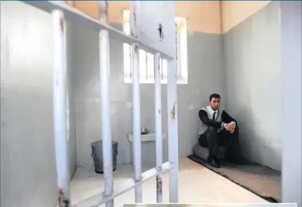  ?? PICTURES: BRENTON GEACH ?? A DIFFERENT PURPOSE: The Nelson Mandela Robben Island replica prison cell was unveiled at Spine Road High School in Mitchells Plain, Cape Town, yesterday. Inset: Andrew Mlangeni was one of the stalwarts present.