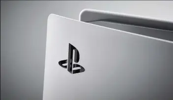  ??  ?? RIGHT The PS logo stands out on the pristine white shell
