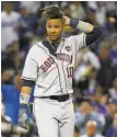  ?? Ezra Shaw / Getty Images ?? Houston first baseman Yuli Gurriel got a harsh reception from fans at Dodger Stadium.