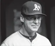  ?? WILL VRAGOVIC/TRIBUNE NEWS SERVICE ?? Oakland Athletics manager Bob Melvin in the dugout in St. Petersburg, Fla., on May 13, 2016.