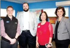  ?? NWA Democrat-Gazette/CARIN SCHOPPMEYE­R ?? Margot Lemaster, Ozark Literacy Council executive director (from right), is joined by Chung Tan, Sam Marshall and Cody Black, board members, at the April 6 open house.