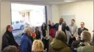  ?? BRIAN HUBERT — DAILY FREEMAN ?? U.S. Rep. Antonio Delgado speaks with attendees at Sunday’s open house for his district office in Kingston.